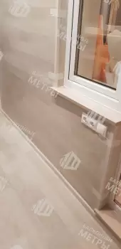 Панорамное остекление с тонировкой и отделка балкона